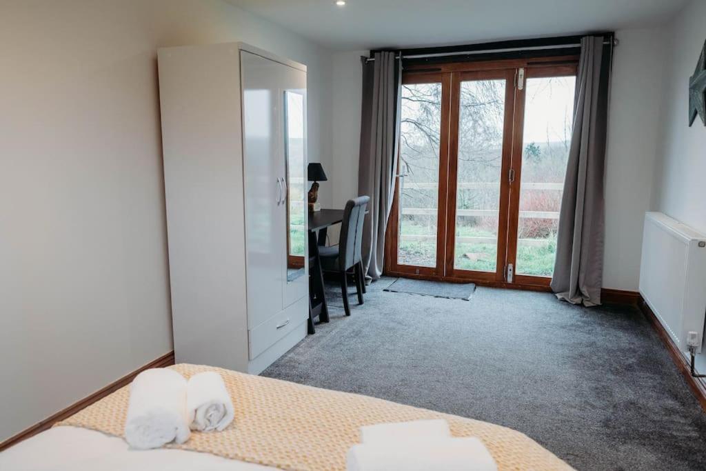 Holiday home Woodpecker Lodge- A Pet Friendly Rural Retreat *